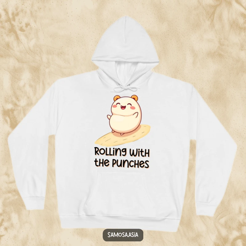 Funny hoodie: a smiling bao bun character joyfully rolling down a gentle slope, offering warmth and a humorous, carefree vibe.
