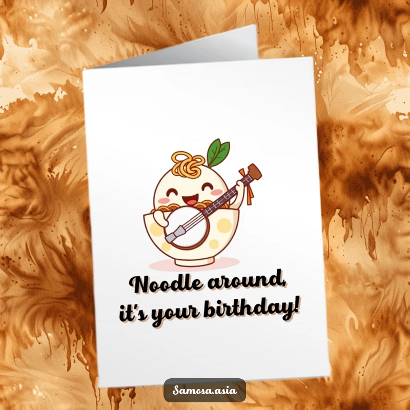 Funny Free Printable Birthday Card of a happy ramen bowl with noodle arms playing a tiny banjo with gusto. Festive and musical.