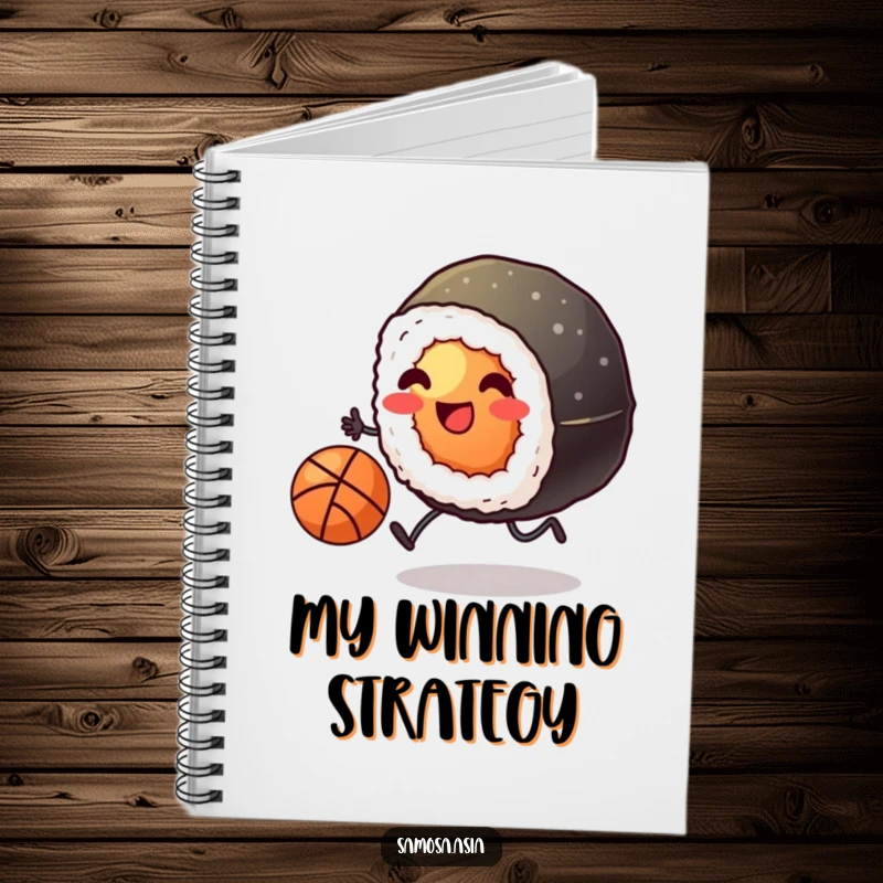 Funny notebook featuring a smiling sushi roll with tiny legs kicking a basketball, ideal for jotting down ideas with a humorous, sporty touch.